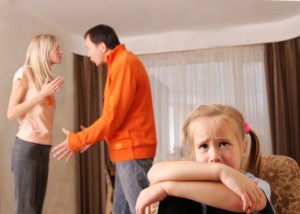 Parents argue while small child cries - addiction, recovery and the family