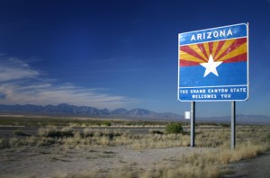 photo of Arizona desert landscape and state sign The Grand Canyon State Welcomes You - Arizona Addiction Interventions